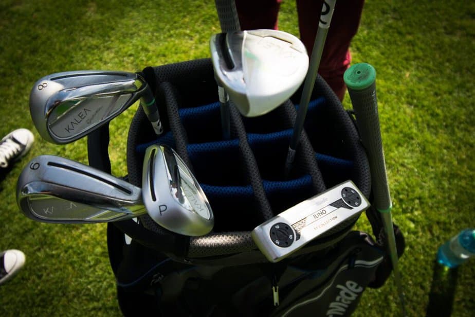 You and your playing partner can share the same golf bag, but it's not permitted to use each other's clubs during the game